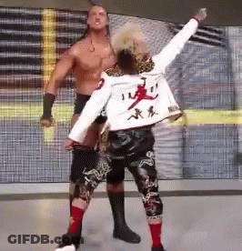 Shirtless Wrestlers White Jacket Chinese Writing GIF