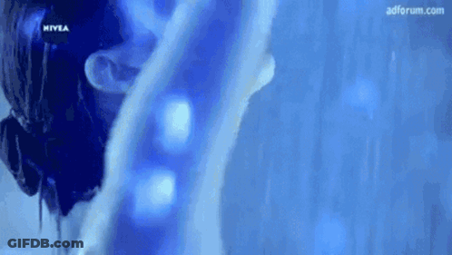 Shirtless Young Man With Arm Tattoo Saying H GIF