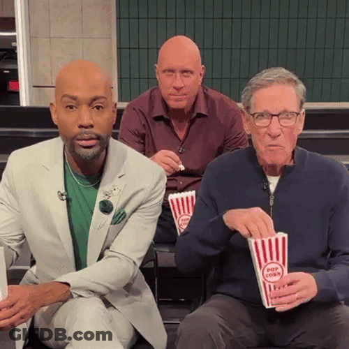 Shocked Maury Eating Popcorn GIF