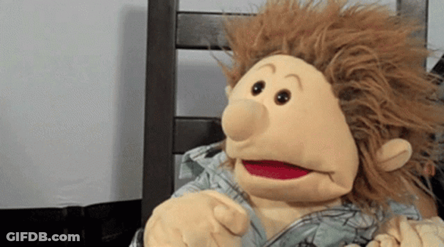 Shocked Puppet Hand Over Mouth GIF
