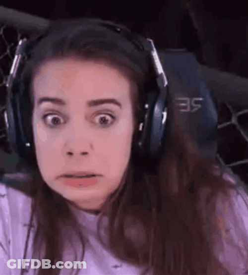 Shocked Woman Terrified Playing GIF