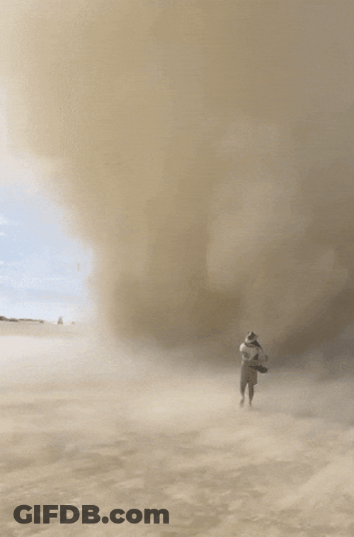 Shocking Daredevil Walking Through Dust Storm GIF