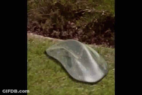 Shoes Hanging On Chain Link Fence Tennis Court GIF