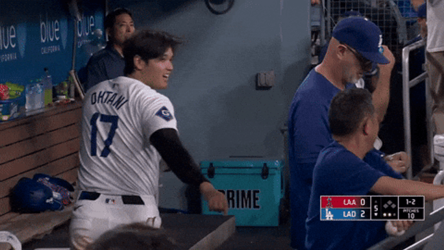 Shohei Ohtani Pointing At His Coach By The Bench GIF