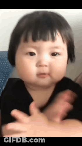 Short-Haired Baby Girl Clapping And Making A Face GIF