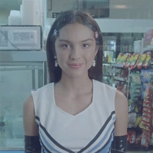 Shoulder Shrug Olivia Rodrigo GIF
