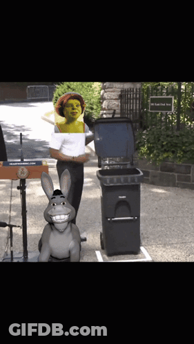 Shrek And Donkey Are Standing Next To A Trash Can With The Lid Open GIF