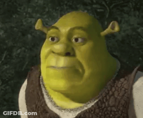 Shrek From Shrek Is Making A Funny Face While Wearing A Brown Vest . GIF