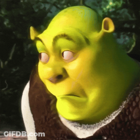 Shrek From The Movie Shrek Is Making A Funny Face With His Eyes Closed GIF