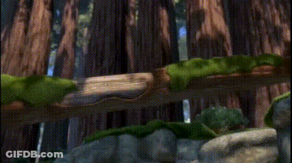 Shrek Is Standing In The Middle Of A Rocky Area With The Word Alone Written On The Bottom . GIF