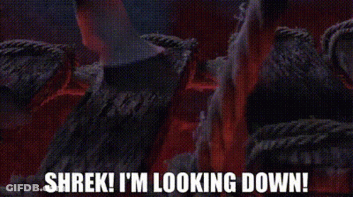 Shrek Looking Down From Behind Wooden Fence GIF