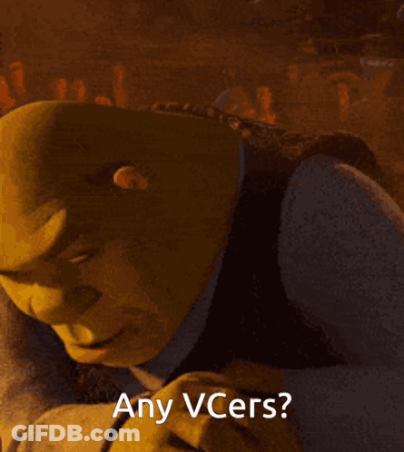Shrek Says " Any Vcers " In A Dark Room GIF