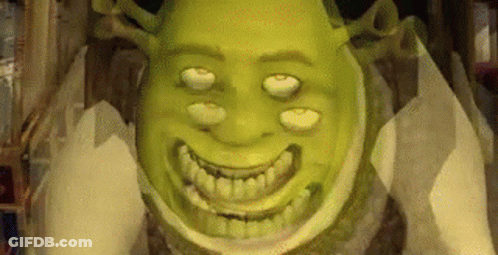 Shrek Smiling Sitting On Toilet Paper GIF