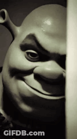 Shrek Statue Peeking Smiling GIF