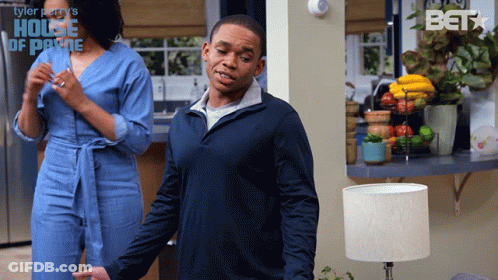 Shrug Doc Shaw GIF