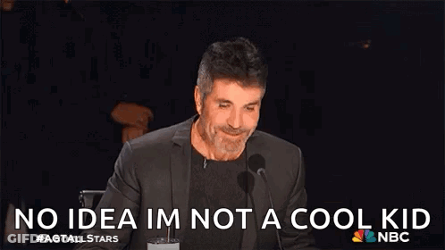 Shrug Simon Cowell GIF