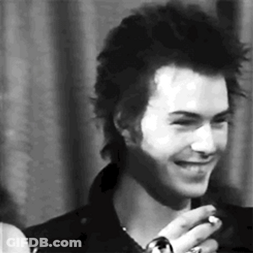 Sid Vicious Punk Smile Smoking GIF