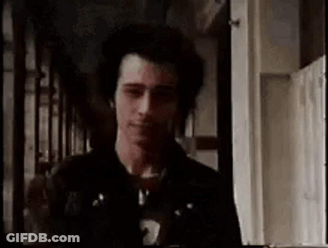 Sid Vicious Showing Knife GIF
