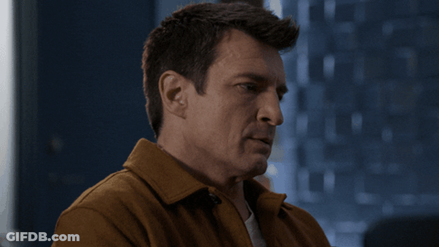 Side Profile Sad Nathan Fillion GIF