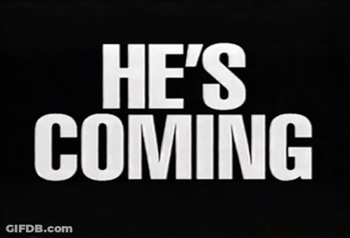 Sign Saying He's Coming GIF