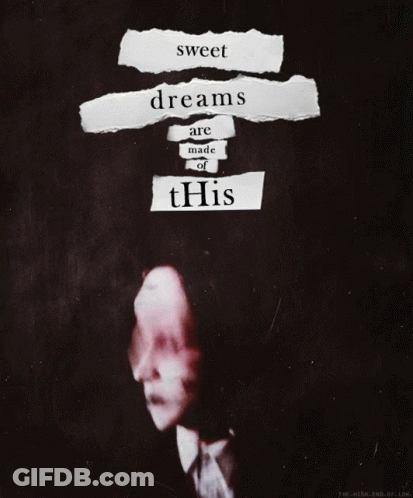 Sign Saying Hopes And Dreams On Wooden Table GIF