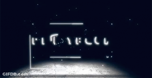 Sign Saying Playbuck In Dark Room GIF