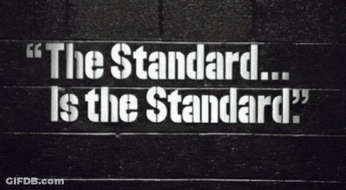 Sign Saying The Standard Is The Standard GIF