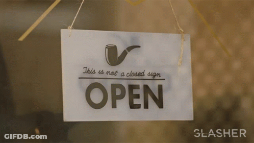 Sign Saying This Is Not A Closed Sign Is Open GIF
