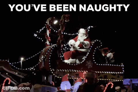 Sign Says You've Been Naughty Next To Santa Sleigh GIF