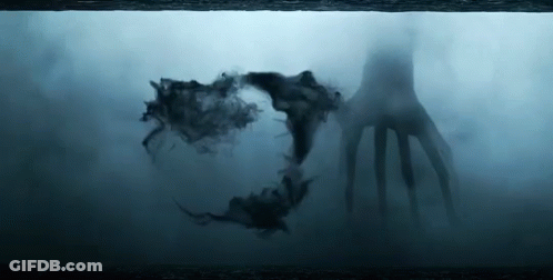 Silhouette Hand Coming Out Of Water In Dark Room GIF