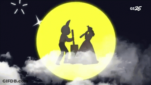 Silhouette Man And Woman In Front Of Full Moon GIF