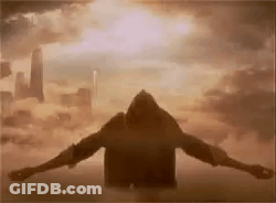 Silhouette Man Arms Outstretched In Sky GIF