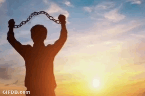 Silhouette Man Holding Chain At Sunset GIF