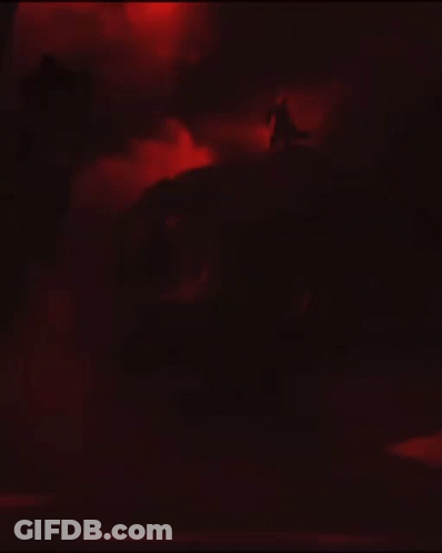 Silhouette Man Holding Sword With Lightning From Arm GIF