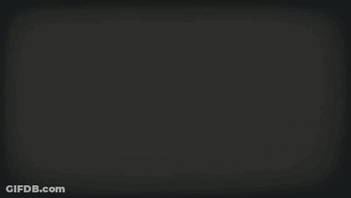Silhouette Man Standing Next To Flaming Car GIF