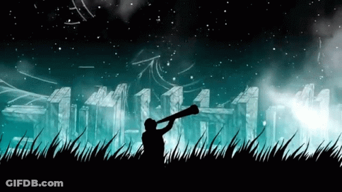 Silhouette Of Man Holding Megaphone In Front Of City At Night GIF