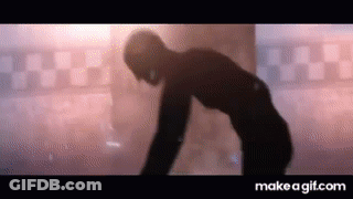 Silhouette Of Man In Checkered Floor Room GIF