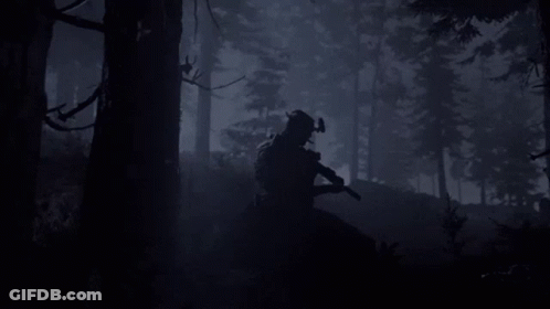 Silhouette Of Man In Dark Forest GIF