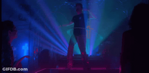Silhouette Of Man In Front Of Crowd In Club GIF