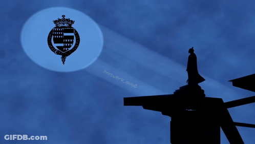 Silhouette Of Man On Building With Full Moon GIF