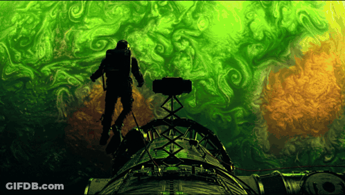 Silhouette Of Man On Green And Orange Object GIF