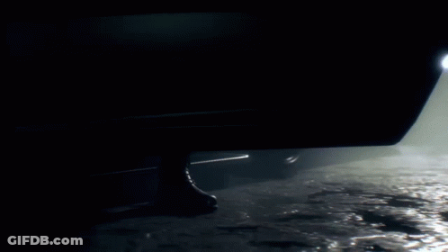 Silhouette Of Man Standing Next To Car GIF