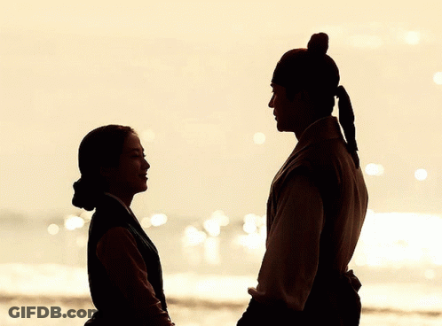 Silhouette Of Man Touching Woman's Forehead GIF
