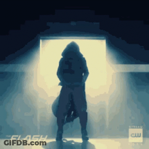 Silhouette Of Person In Doorway With Flash GIF