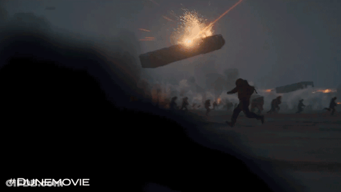 Silhouette Person In Front Of Wall Of Flames #Dunemovie GIF