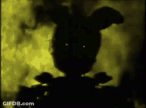 Silhouette Rabbit With Bow Tie On Yellow Background GIF