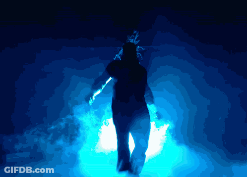 Silhouette Standing In Dark Room GIF