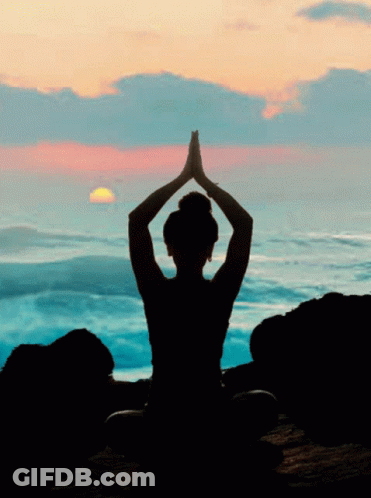 Silhouette Woman Meditating In Lotus Position GIF