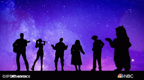 Silhouetted Group Against Starry Sky With NBC Logo GIF