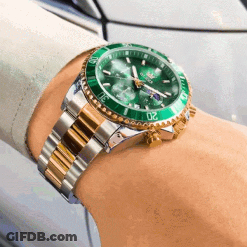 Silver And Gold Watch Saying O'clock GIF